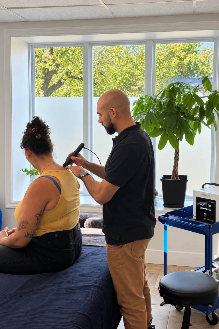 Shelby working with a client in the Archer Health clinic